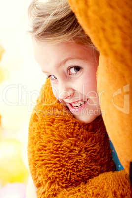 Portrait of emotional girl with teddy bear