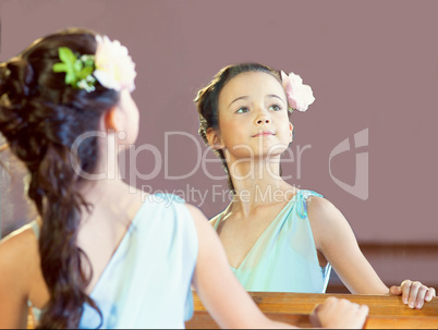 Reflection of graceful little ballerina, close-up