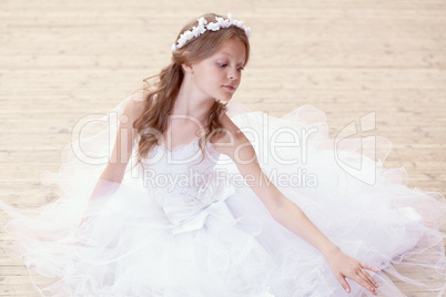 Portrait of gorgeous little ballerina dancing