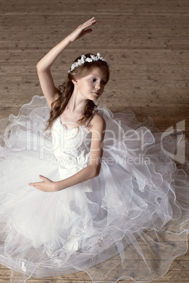 Image of lovely ballerina posing at camera