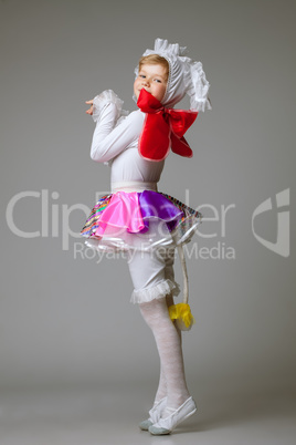 Charming little girl posing in dance costume