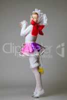 Charming little girl posing in dance costume