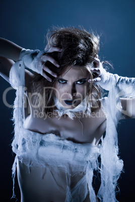 Portrait of attractive girl posing as zombie
