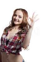 Cheerful girl showing gesture OK