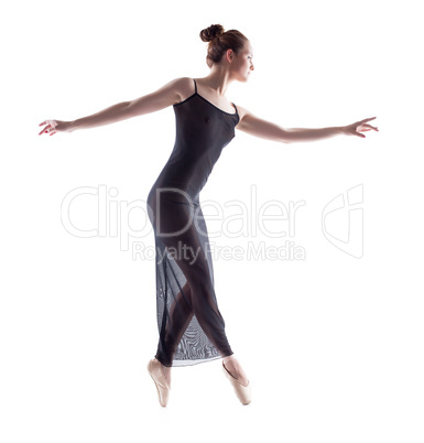 Side view of graceful ballerina dancing