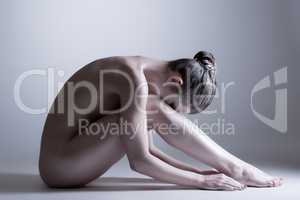 Nude model posing at camera. Concept of inner calm