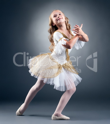 Studio shot of graceful little ballet dancer