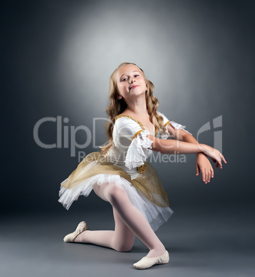 Image of nice little ballerina posing at camera