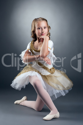 Amazing little ballet dancer posing at camera