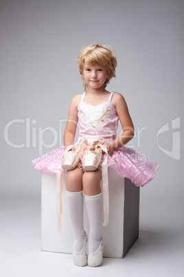 Nice little ballerina posing with pointes