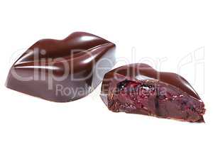 Chocolate candy in form of lips with cherry
