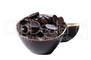 Chocolate cup with filling isolated on white