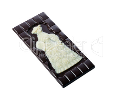 Tasty bar of dark chocolate with white pattern