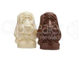 Image of two chocolate Basset Hound figurines