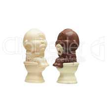 Image of two chocolate children figurines