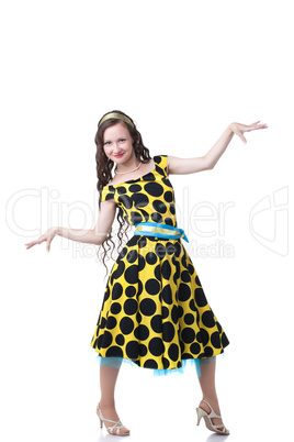 Cute freckled girl posing in polka dot dress