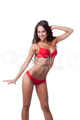 Studio shot of happy skinny woman in red lingerie