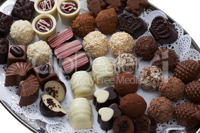 Appetizing chocolate candies assortment, close-up