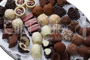 Appetizing chocolate candies assortment, close-up