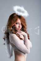 Portrait of lovely red-haired angel