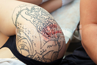Image of unfinished tattoo, close-up