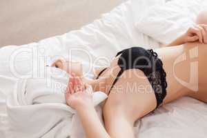 Slender woman resting after shower, close-up