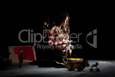 Image of naked female circus performer