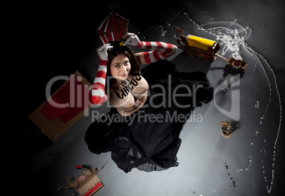 Top view of sexy circus performer posing in studio