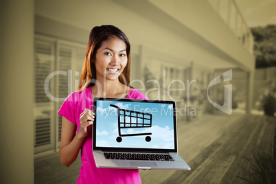 Composite image of smiling asian woman holding computer