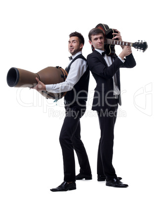 Funny guys posing with musical instruments