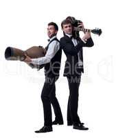 Funny guys posing with musical instruments