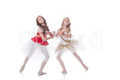 Shot of graceful young ballerinas posing at camera