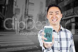Composite image of portrait of happy man showing smart phone