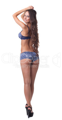 Attractive underwear model posing back to camera