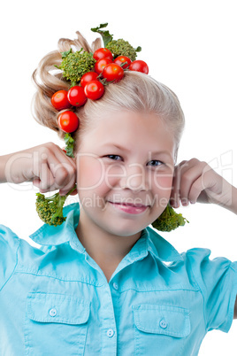 Funny girl tries on broccoli as earring