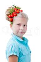Funny girl posing with wreath of tomatoes