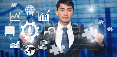 Composite image of unsmiling businessman holding