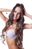 Happy pretty model with long curly hair, close-up