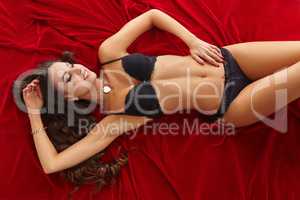 Seductive slim model advertises lingerie