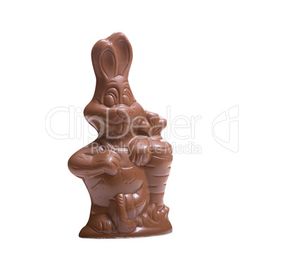 Chocolate bunny with carrot, isolated on white