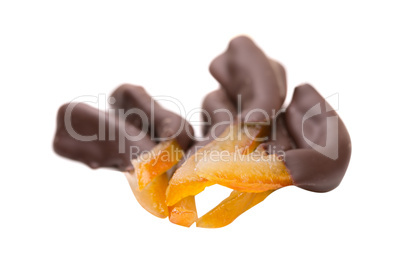 Orange slices in dark chocolate, close-up