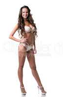 Gorgeous tanned model posing in lingerie