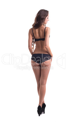Curvy lingerie model posing back to camera