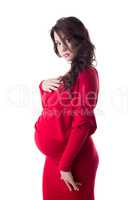 Beautiful curly-haired pregnant woman