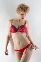 Studio shot of blond model advertises underwear