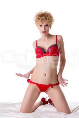 Image of platinum blonde posing in red lingerie