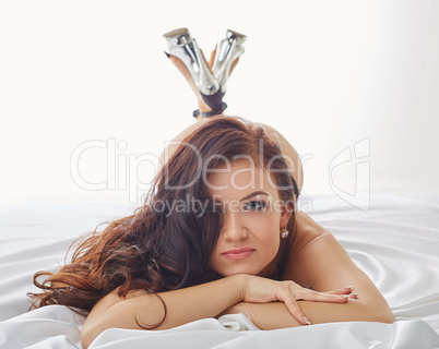 Portrait of sexy young woman posing at camera