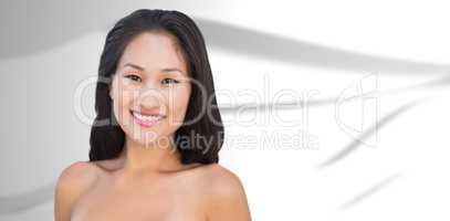 Composite image of smiling sensual nude brunette posing