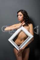 Sexy topless model framed her body