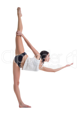 Attractive brunette doing vertical split